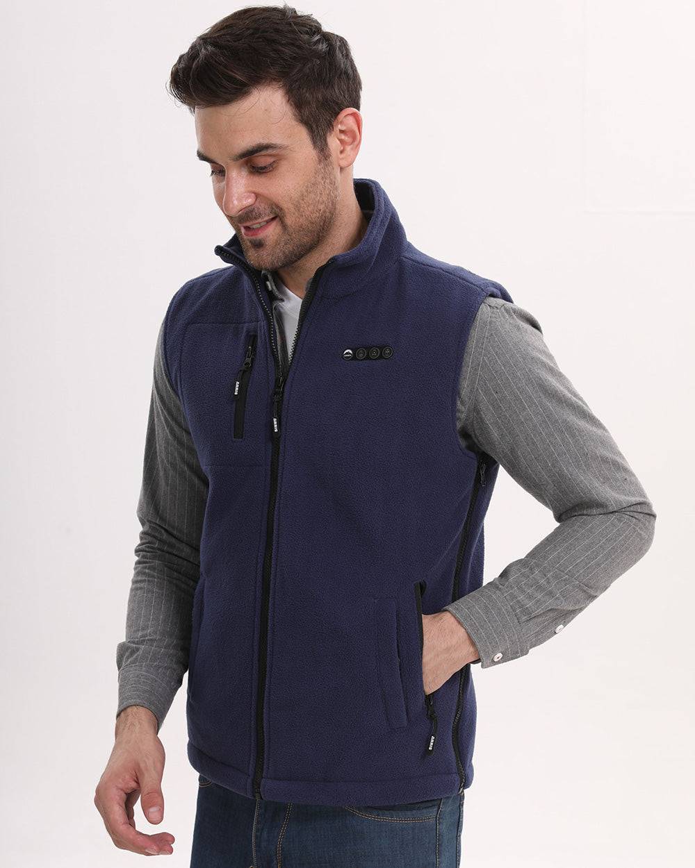 there is standing a man who is wearing arris fleece heated vest in navy blue